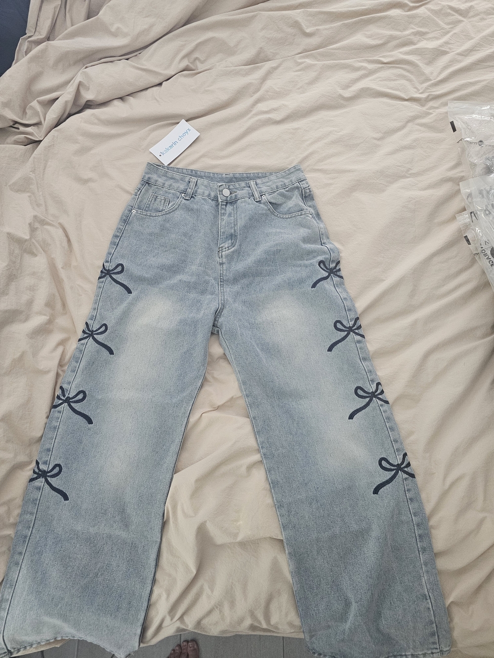 Light Blue Wide-Leg Jeans with Bow Detail
